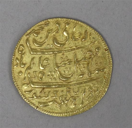 An Indian style gold coin Dia 27mm; 8.8g